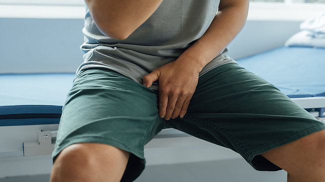 Urologenzentrum Wien - Mikrolithiasis im Nierenbereich bei einer Person, die sich im Sitzen befindet.