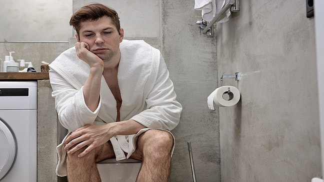 Urologenzentrum Wien - Harnstau bei einer Person, Unwohlsein beim Toilettengang.